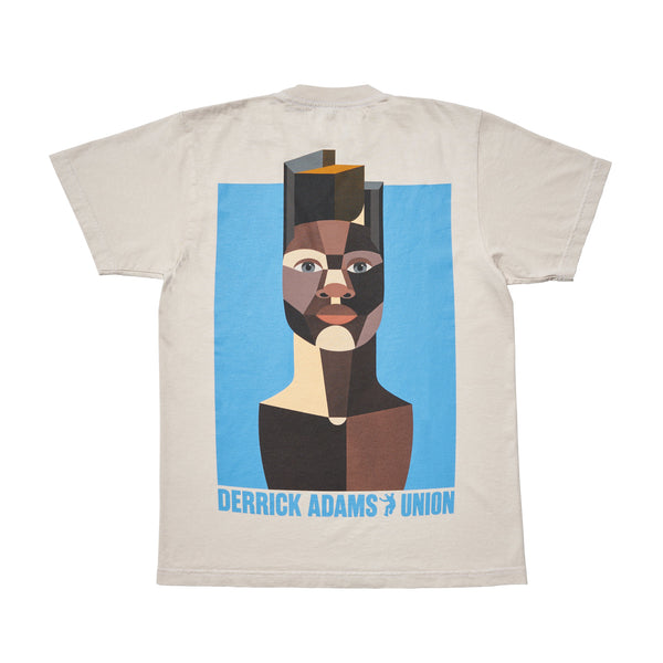 Back of the beige Derrick Adams × Union: Art Tee