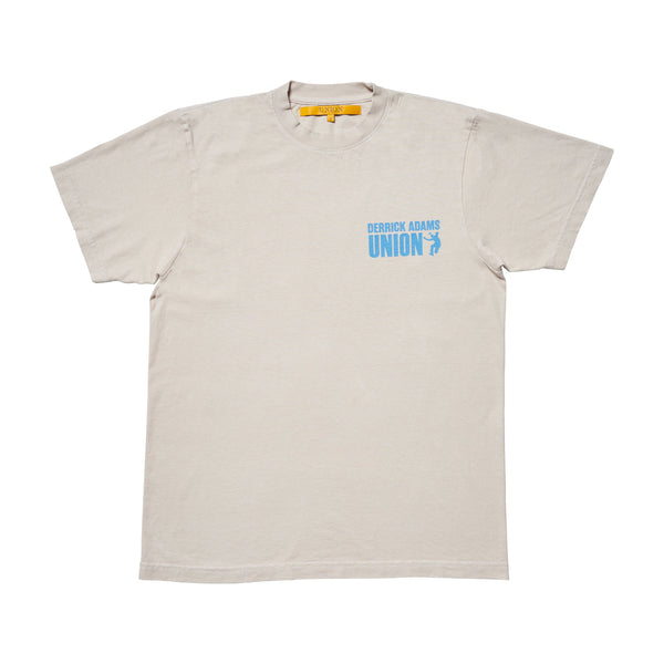 Front of the beige Derrick Adams × Union: Art Tee