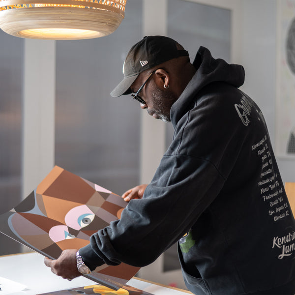 Image of Derrick Adams with the Fixing My Face print