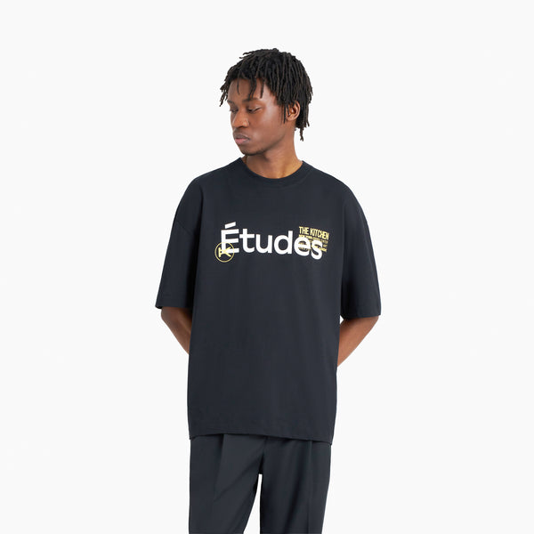 Model wearing The Kitchen × Études Studio T-shirt