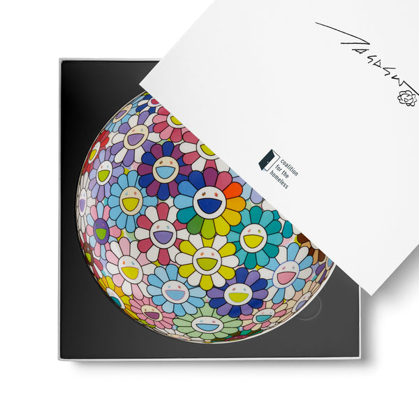 Dinner plate featuring artwork by Takashi Murakami in a box
