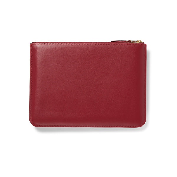 Back of Comme des Garçons: Outside Pocket Pouch in red