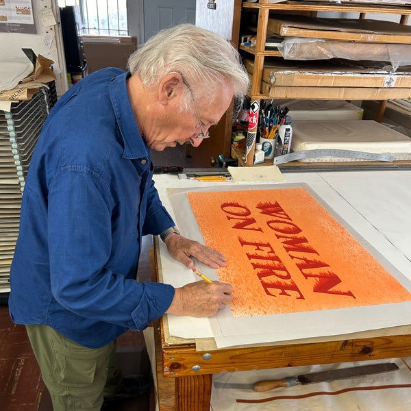 Image of Ed Ruscha signing print
