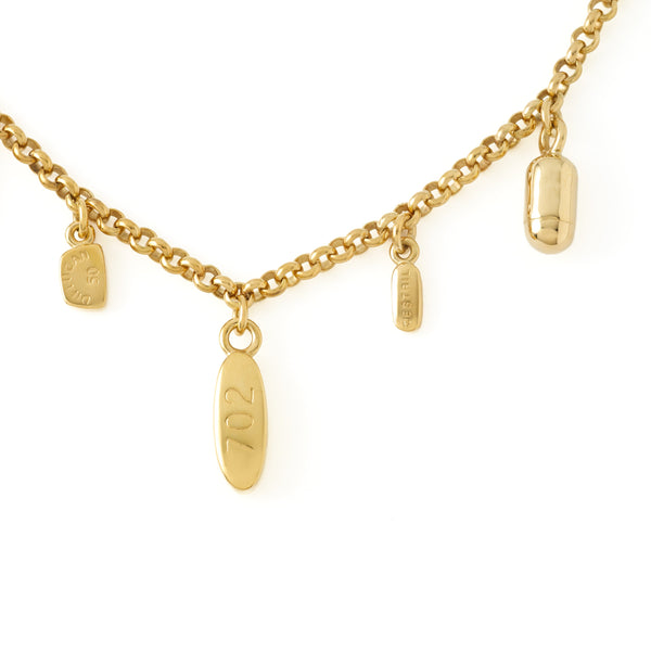 Detail of Damien Hirst: 5 Pill Necklace (Yellow Gold)